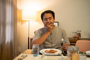 muslim couple having break fast or sahur in the morning