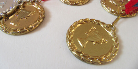 Gold  Medal with Ribbon on White Background