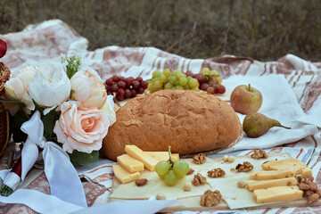 Wedding picnic with bread and grapes