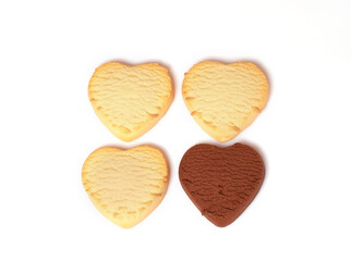 Three lemon cookies and one chocolate heart-shaped