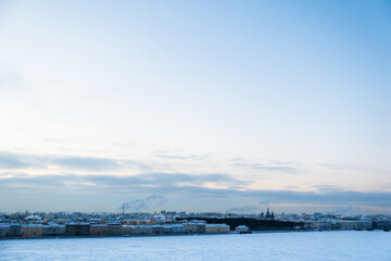 St. Petersburg, Russia - December, 2021: View of frozen Neva River and city center in early morning.