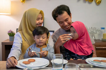 muslim asian family breaking the fast together