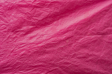 Pink rumpled wrapping paper. Image for background. Place for text