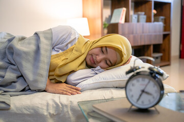 beautiful sleeping muslim woman in the bed