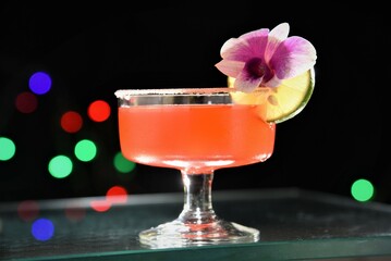 pink cocktail drink on table in the bar