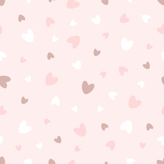 Seamless pattern of hearts on pink