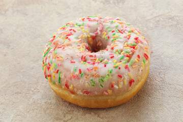 Sweet glazed vanilla donut with icing