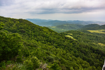 View of the valley from the glass bridge in the Sataplia Nature Reserve. The Caucasus Mountains. Georgia. 2019.