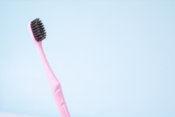 toothbrush isolated on blue background. Copy space