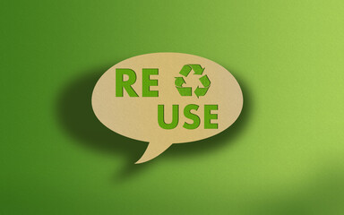 Reuse Text on Recycled Craft Paper Againt Green Grass Background