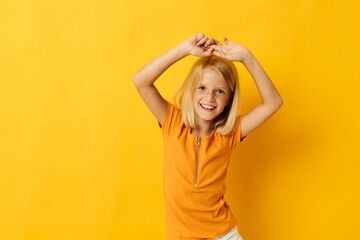 Fototapeta na wymiar Young blonde girl smile hand gestures posing casual wear fun isolated background unaltered