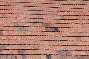 Naklejka premium red roof tiles on roof