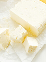 Cream butter on white
