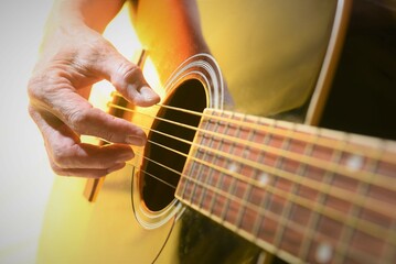 Fototapeta premium person playing guitar
