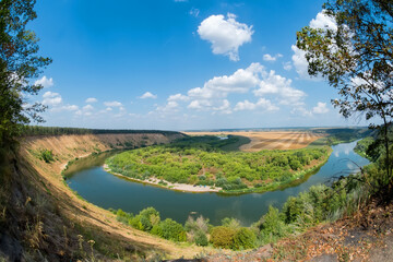 Fototapeta na wymiar Panorama of the tract Krivoborye, Ramonsky district of the Voronezh region. Steep forested sandy slope of the Don River