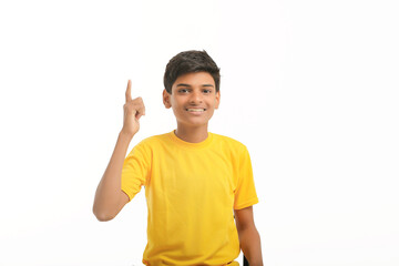 Fototapeta premium Indian child giving expression on white background.