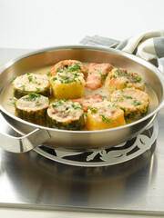 Calabacines rellenos de marisco. Zucchini stuffed with seafood.