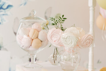 Beautiful candy bar decor with homemade craft marshmallows and cupcakes