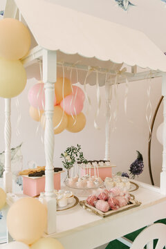 Beautiful Candy Bar Decor With Homemade Craft Marshmallows And Cupcakes In A Wooden White Cart