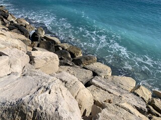 Rocky coastline, sea rocks texture 