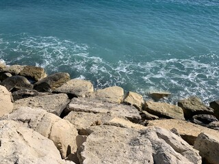 Rocky coastline, sea rocks texture 