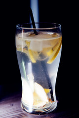 alcohol drinks and luxury concept — glass of cocktail at bar