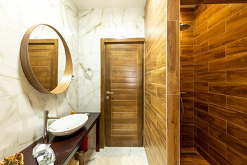 Interior of a brown tiled bathroom