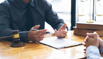 Businessman and lawyer discuss the contract document. Treaty of the law. Sign a contract business....