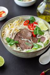 Pho Bo vietnamese soup with beef. Asian food. National cuisine.