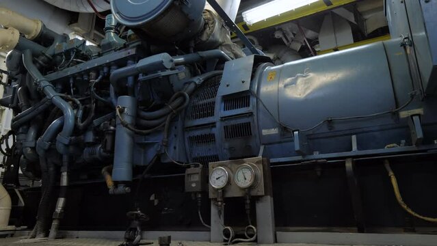 Manometers on diesel generator in engine room of ship