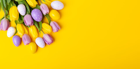 Fototapeta na wymiar Easter greeting card. Multicolored easter eggs and tulips on yellow background. Easter concept