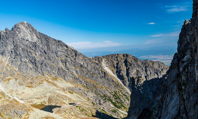 Mala Studena dolina with Teryho chata and Lomnicky stit mountain peak above from Priiecne sedlo in Vysoke Tatry mountains in Slovakia