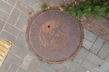 manhole cover in the street