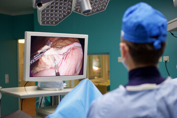 Laparoscopic surgeon looking at monitor during laparoscopic surger