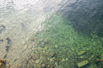 Fototapeta na wymiar Clear Bohinjsko Jezero Water. Bohinj, Slovenia