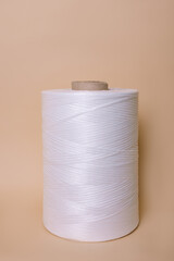 White thread for the cake on the background