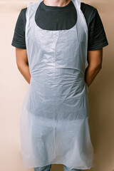 Plastic apron on male body Eco concept