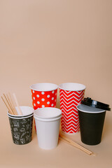 Paper cups for coffee made of eco plastic on the background
