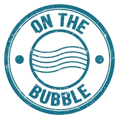 ON THE BUBBLE text on blue round postal stamp sign