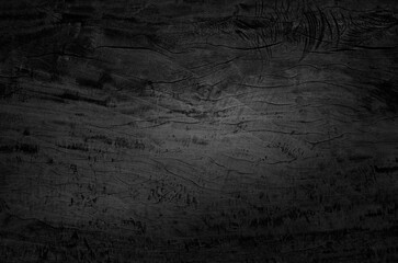 Obraz premium Black wood texture background coming from natural tree. Wooden panel with beautiful patterns.
