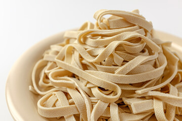 tofu noodles on a white background