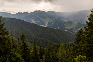 Fototapeta na wymiar Landscape of Nizke Tatry mountains from Krakova hola mountain with Chopok peak visible, Slovakia