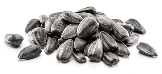 Fotobehang Pile of whole sunflower seeds isolated on white background. © volff