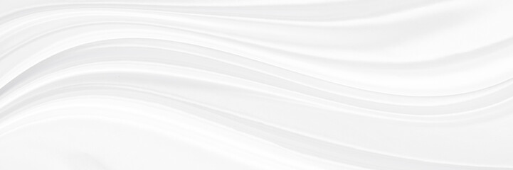 White gray satin texture that is white silver fabric silk background with beautiful soft blur...