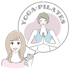 スマートフォンでヨガの動画を見る女性