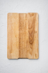 Wooden cutting board, on white stone table background, top view flat lay , with copy space for text or your product