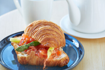 croissant and cup of coffee