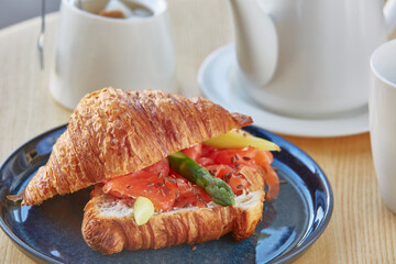 breakfast with croissant and coffee