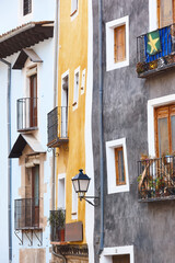 Traditional multi colored street in Cuenca world heritage old town. Spain