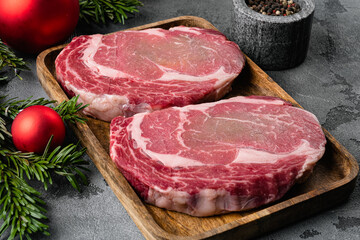 Classic fresh steak, on gray stone table background